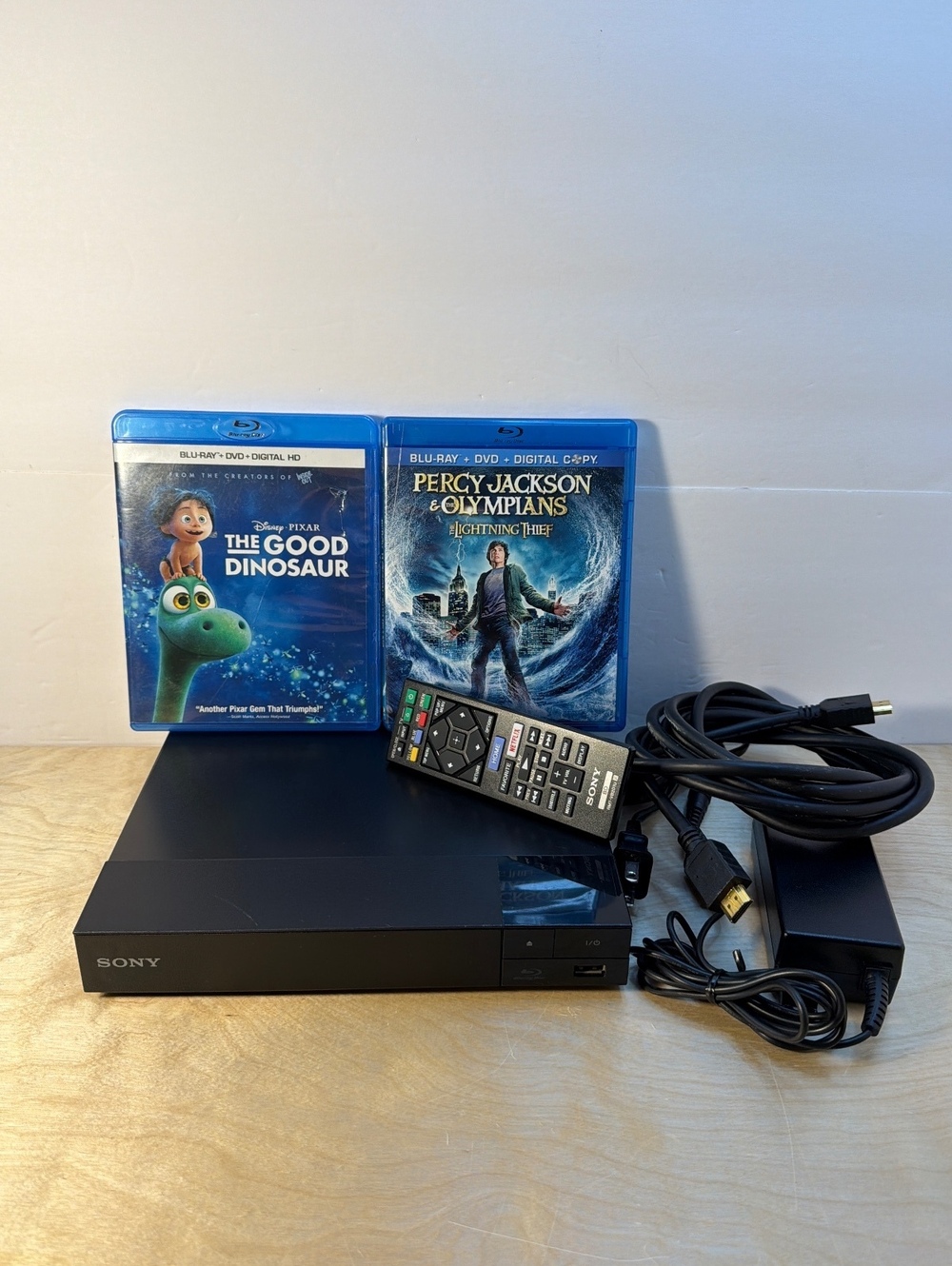 Sony BDP-S2500 Blu-ray DVD Player with Remote Power Adapter & Movies Bundle